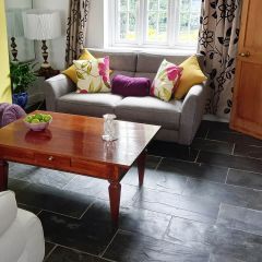 Brushed charcoal grey slate tiles 600x300mm_pictured in a livingroom