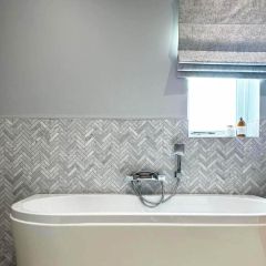  Chicago honed chevron mosaic wall tiles in a contemporay bathroom with free standing bath
