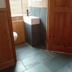 Natural black slate tiles 600x300mm_ Holiday cottage cloak room floor & walls