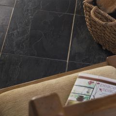 Natural black slate tiles 300x300mm_close up of structure with brown chair and log basket