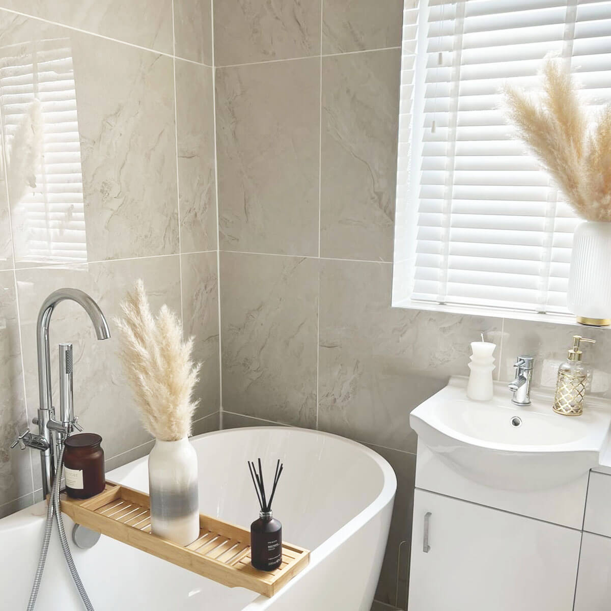 Cream polished tiles pictured in a contemporary bathroom with bathroom accessories