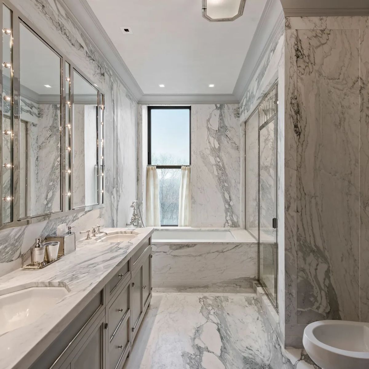 Bathroom image of the Astor suite of New York City's The Plaza Hotel featuring extra large abthroom tiles