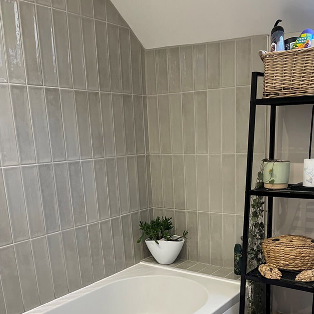 latte colour brick wall tiles in a small bathroom