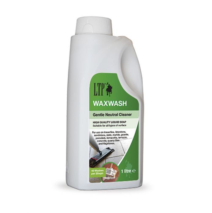 A bottle of waxwash neutral tile cleaner 